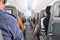 Unidentified passengers sitting on seats in airplane