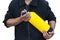 Unidentified people holding yellow oxygen tank. Man prepare and