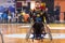 unidentified people play a friendly game of wheelchair basketball at Nick Galis stadium