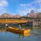 Unidentified people ride Himeji boat tour around the outer moat of Himeji castle during full bloom