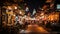 Unidentified people sit in outdoor cafe street Chiang Mai old town at night, Thailand