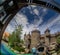 Unidentified people visit fairytale castle with extreme rope ladder way