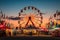 Unidentified people visit the Santa Monica Fair at sunset. The Santa Monica Fair is one of the largest outdoor events in the world