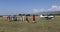 Unidentified people visit small sports planes at the aviation rally, Stanesti aerodrome, Gorj, Romania