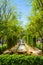 Unidentified people walking in Palma jardines Aludaina Palace gardens water fountain. Palma de Mallorca, Balearic