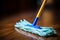 Unidentified person cleaning office floor, detailed shot, bright and wide, with blurred background