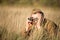 Unidentified re-enactor dressed as Soviet soldier looks at an old army