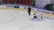 Unidentified reporter filming goalkeeper J. Metsola 77 during hockey game Vityaz vs Salavat Yulayev