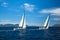 Unidentified sailboats participate in sailing regatta