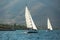 Unidentified sailboats participate in sailing regatta