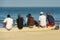 Unidentified Senegalese boys hang out on the coast of the ocean