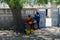 Unidentified Senegalese boys hang out near the tree.