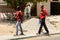 Unidentified Senegalese two boys walk beside the road near the