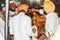 Unidentified sikh people decorating idol with ornaments and flower for final make up before Puja.