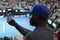 Unidentified spectator uses his cell phone to take images during tennis match at 2019 Australian Open in Melbourne Park
