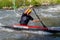 Unidentified sportsman struggling with the flow. in La Seu d`Urgell, Catalonia. Parc Olimpic del Segre