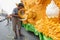 Unidentified thai people candle Carver on the traditional candle procession festival of Buddha