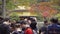 Unidentified tourist looking to Kinkakuji the Golden temple pavilion in Kyoto Japan