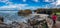 Unidentified tourist woman takes photos to cathedral beach