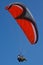 Unidentified tourists paragliding over the