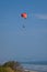 Unidentified tourists paragliding over the