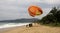 Unidentified tourists prepare for parasailing on Karon beach, Phuket, Thailand