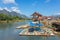 Unidentified tourists rest in riverfront restaurant in Vang Vieng, Laos