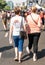 Unidentified woman walking in African Johannesburg Gay Pride March with a tshirt saying Proud Mum