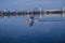 Unidentified young athletes swim in a canoe. The art of steering a boat