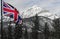 Union Jack flag in front of Mountain scenery