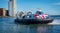 Union Jack hovercraft in Southampton, Hampshire with Itchen Bridge in the background