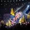 Union Jack and Ukrainian flags wave in solidarity at Eurovision. Generative AI