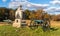 A Union monument and civil war cannons in the Wheatfield on the Gettysburg National Military Park