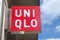 UniQlo shop sign on a wall . Japanese casual wear designer