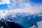 Unique airplane aerial view of central Swiss Alps.