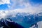 Unique airplane aerial view of central Swiss Alps.