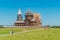 The unique architectural ensemble of ancient wooden architecture of the 18th century on the island of Kizhi. Summer sunny day.