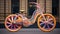 A unique bike design with oversized, clown-like wheels and a colorful,