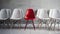 Unique concept red chair stands out among white counterparts