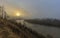 A unique dawn in the Carpathians with fog over a fast river.