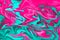 Unique digital fluid art technique background in pink and turquoise colors