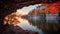 Unique Framing: Sunrise Over Lake In Fall In A Cave