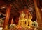 Unique and Gorgeous Golden Four-sided Seated Buddha Images of Wat Phumin Temple, Famous Buddhist Temple in Nan Province, Thailand