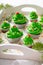 Unique green cupcakes with green flower shaped cream