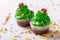 Unique green cupcakes made of green cream for Christmas