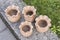 Unique handmade vases of clay before firing and reducing process in wood fire kiln.