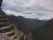 A unique and interesting view of the ancient Inca site of Machu Picchu, nestled high in the Andes Mountains of Peru