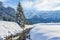 Through this unique mountain landscape of â€‹â€‹Gnadealm Obertauern, Austria, this small river meanders past beautiful sno