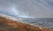 A unique natural attraction. People are walking over the new lavafield of the volcano eruption