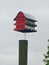 Unique, red, three story apartment type bird house